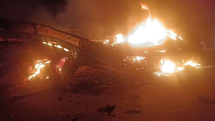 At least nine killed as passenger bus catches fire after colliding with truck in southern India