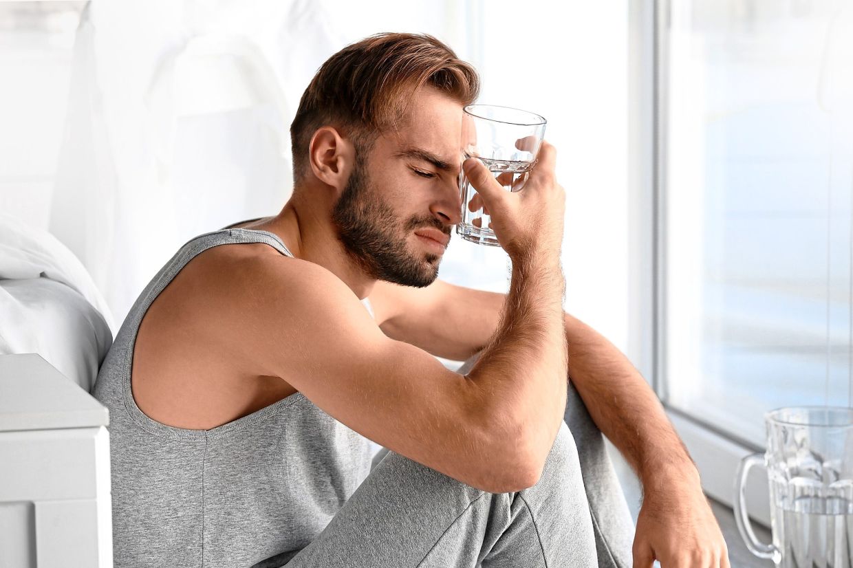 To prevent a hangover, sip your beverages slowly, pace yourself and drink plenty of water to stay hydrated. — AFP