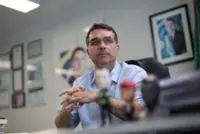 Jair Bolsonaro backs son's Brazil presidential bid, undergoes hernia surgery