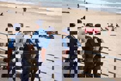 Australian state NSW bans public gatherings for two weeks following the adoption of new law