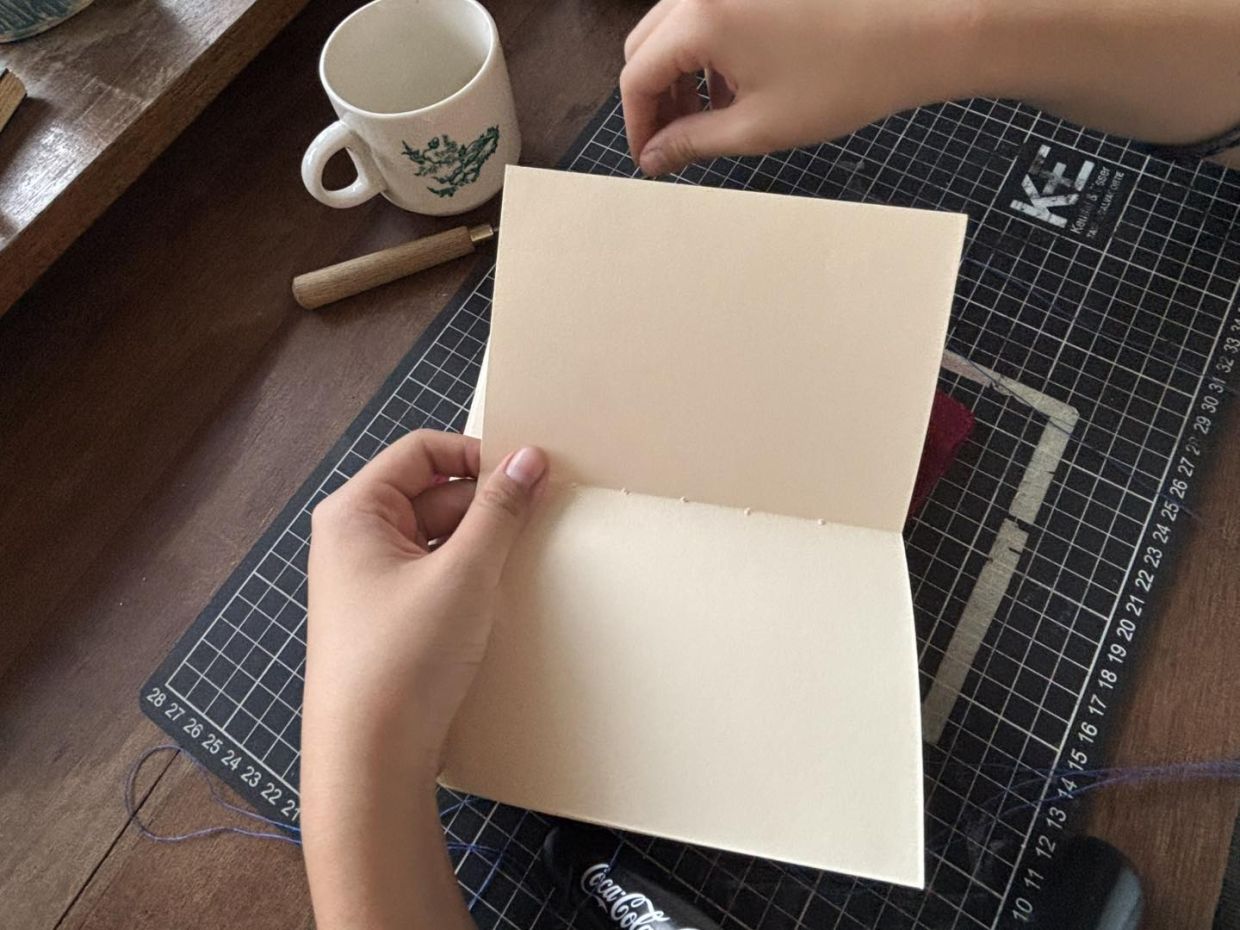 This Sunday, step into the calm of The Lostprints community studio and take time to learn the art of bookbinding. Photo: The Lostprints 