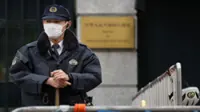 14 injured in Japan after stabbing, liquid spray attack, official says