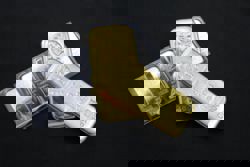 Gold, silver jump to record highs on geopolitics, weak dollar