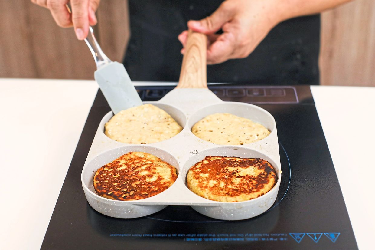 Fry until pancakes puff up and bubbles pop, then flip.