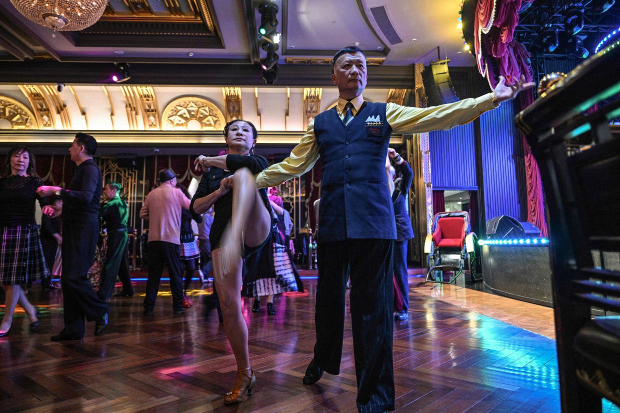 Establishments such as the historic Paramount Ballroom are time capsules from the 1930s, while others flash with neon pink and green rave lights in the early afternoon. Photo: AFP 