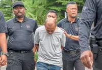 Charged with murder of woman in bag