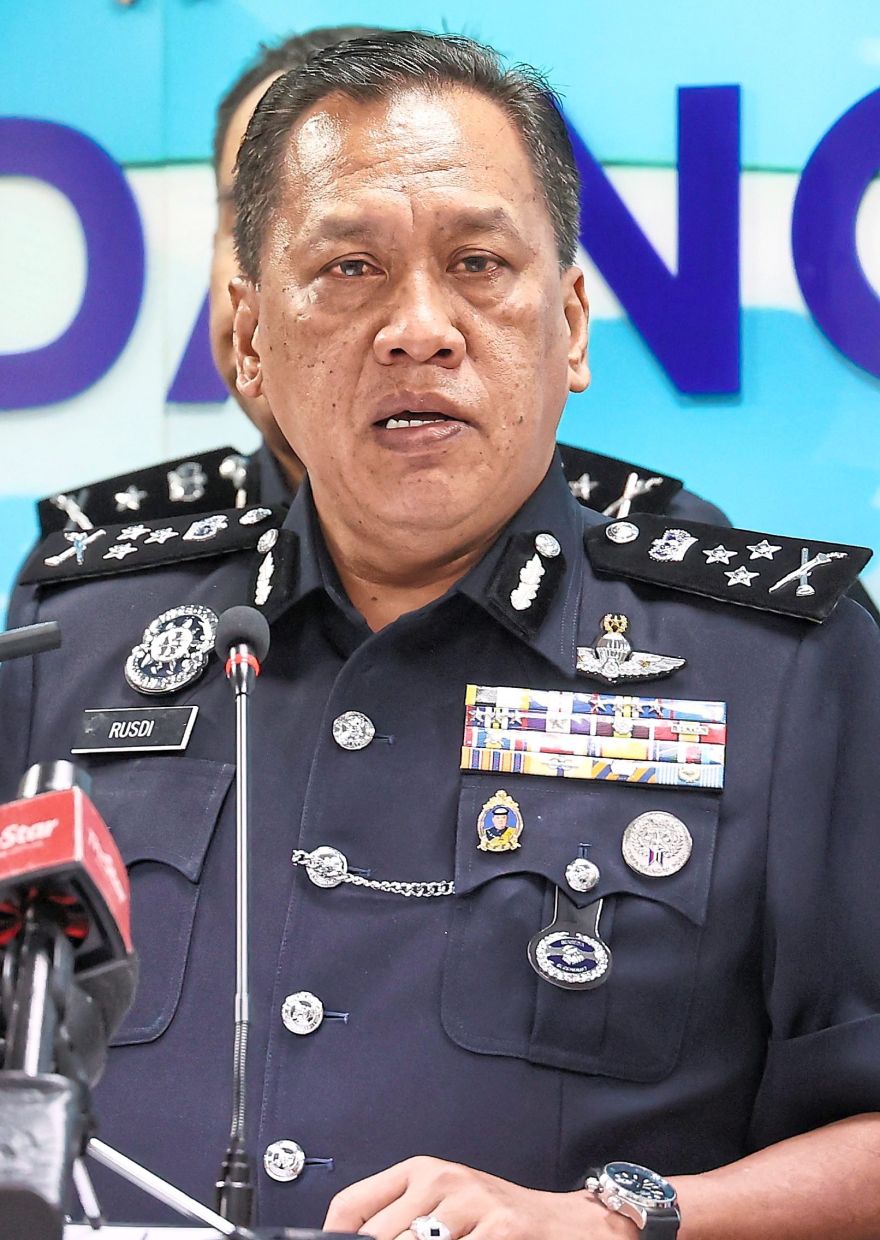 Bukit Aman Commercial Crime Investigation Department (CCID) director Comm Datuk Rusdi Mohd Isa during the press conference in Kuala Lumpur.— MUHAMAD SHAHRIL ROSLI/The Star