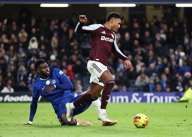 Soccer-Villa stun Chelsea with 2-1 comeback victory