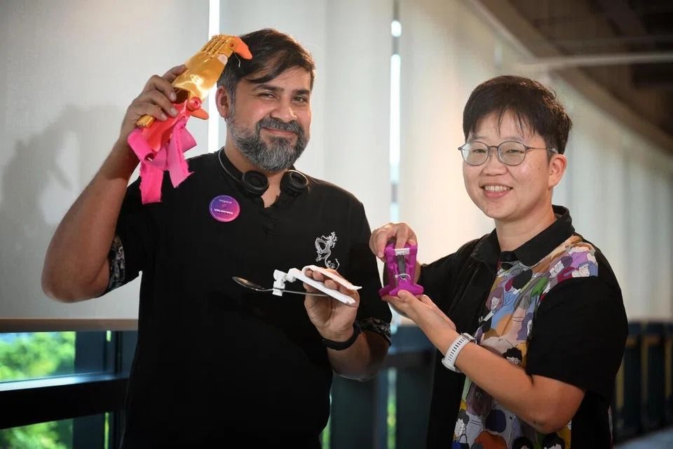 Salvage Garden co-founder Saad Chinoy (left) with volunteer Yeh I-ling. - ST