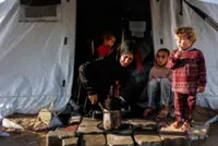 Chilly Gaza braces for more winter rain and word of any progress in ceasefire talks