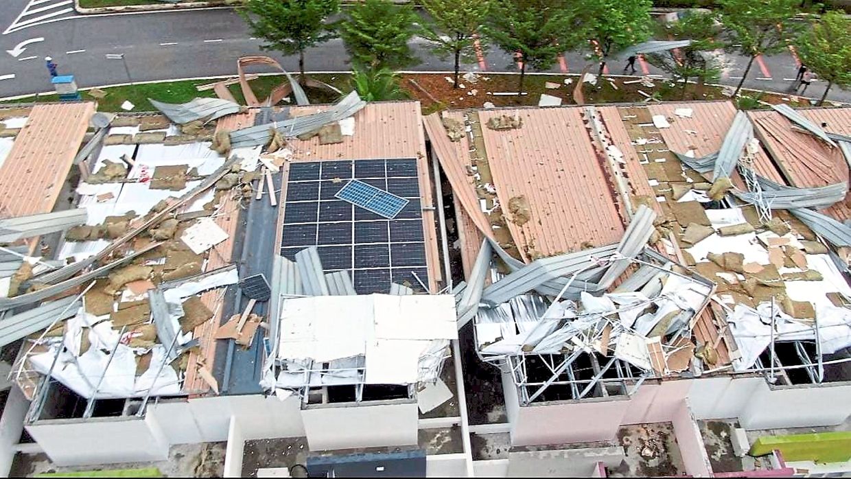 Homes damaged during a storm accompanied by high winds in September.