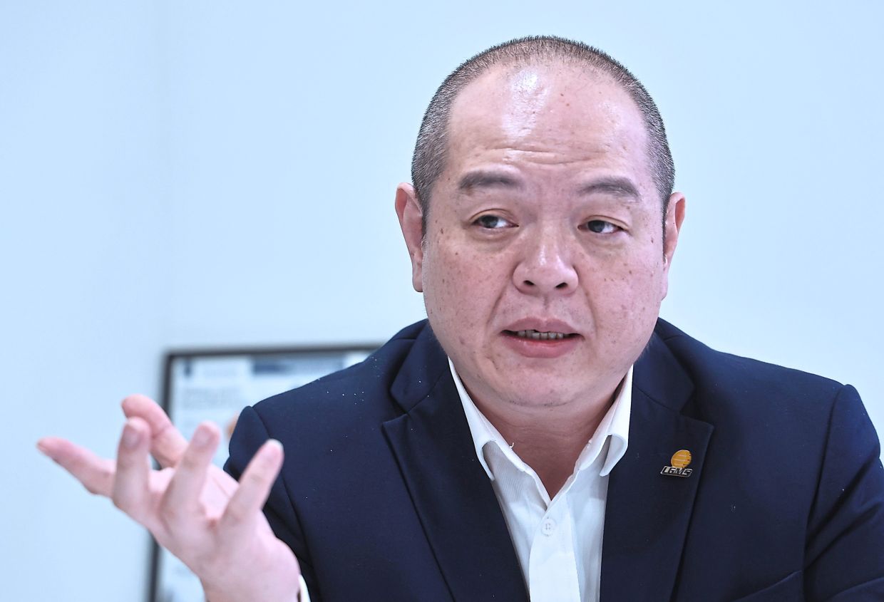 Fong says that paying a small fee for additional protection can be worthwhile, particularly for older users or those who may be less confident navigating online risks. — ART CHEN/The Star