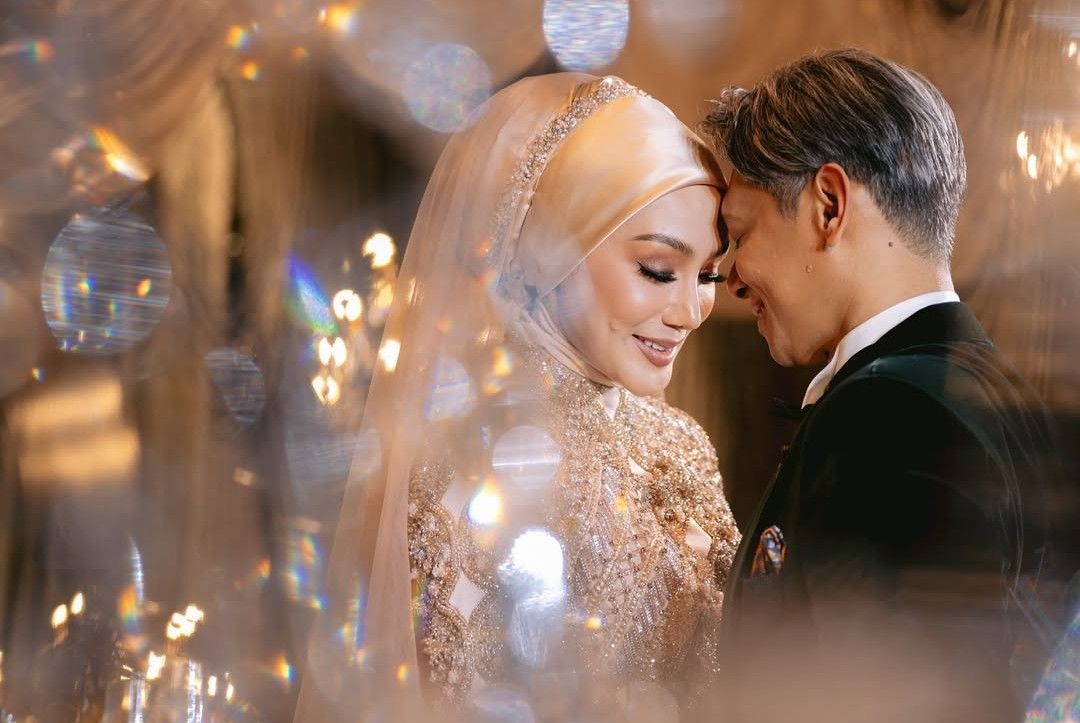 Snapshots of Erra Fazira and Ezwan Zain's dreamy wedding reception