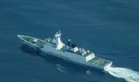 China blames military drills for reef damage around disputed shoal