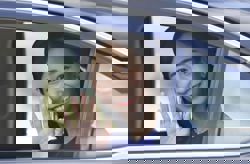 Japan’s Princess Kako, turning 31, waves to crowd gathered along road