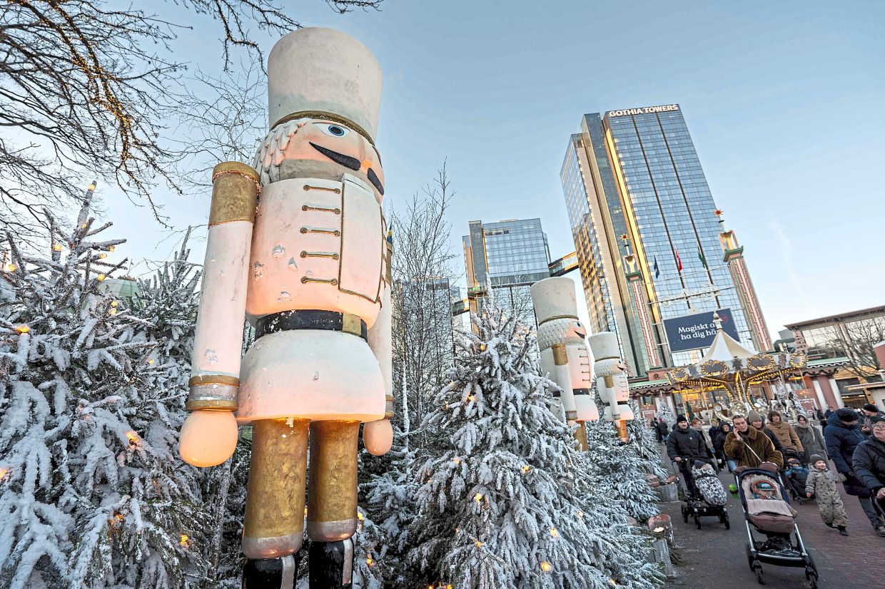 1. A giant Nutcracker figure is seen at the Christmas market in Liseberg Park in Gothenburg, Sweden. — TT News Agency/AFP