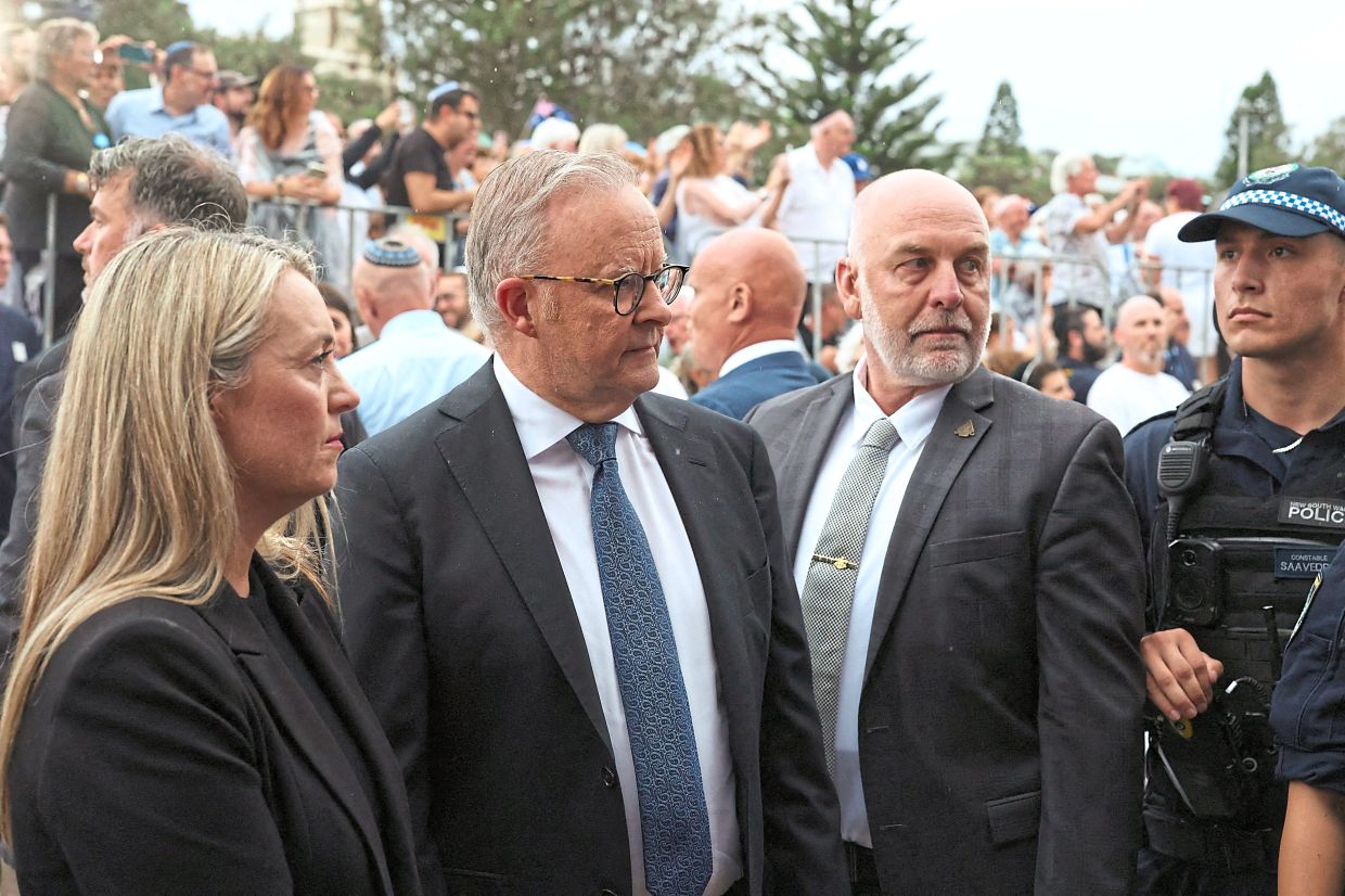 3. Australia’s Prime minister Anthony Albanese and his wife Jodie Haydon attending the ‘Light Over Darkness’ vigil in Sydney, honouring the Bondi victims and survivors. — Reuters