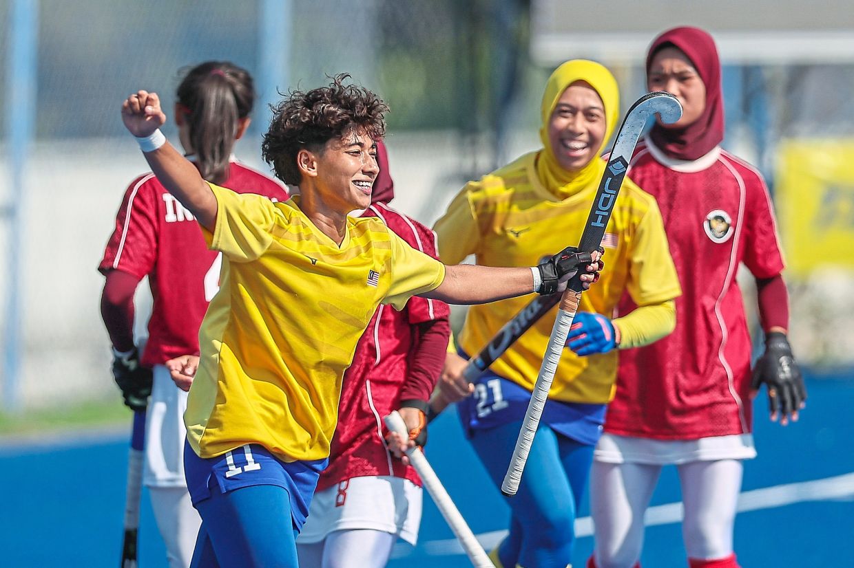 5. Malaysian player Nur Afiqah Syahzani Azhar celebrating a goal against Indonesia during the Women’s Field Hockey Team Final. Malaysia won the gold medal with a 6-0 score. — Bernama