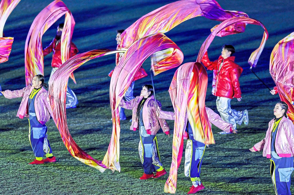7. Performers presenting ‘The Sound of Whistle’ during the closing ceremony. — Bernama