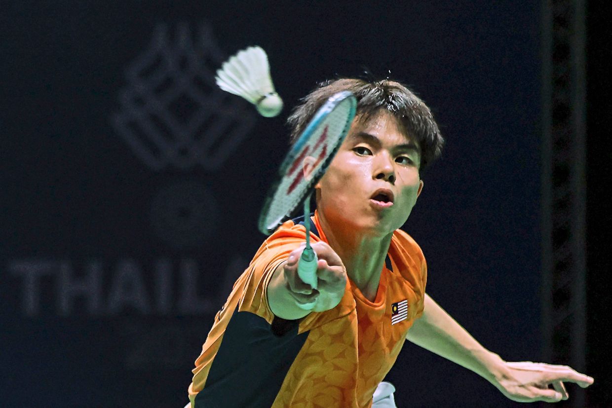 8. Justin Hoh in action against Indonesia during the Men’s Team Final. — Bernama