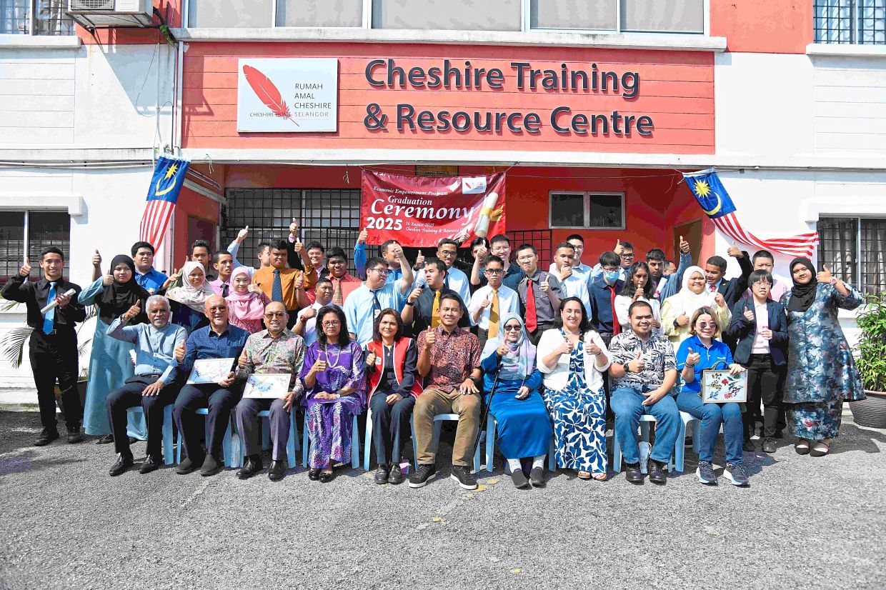 The graduates from Selangor Cheshire Home now skilled in housekeeping and barista services. 