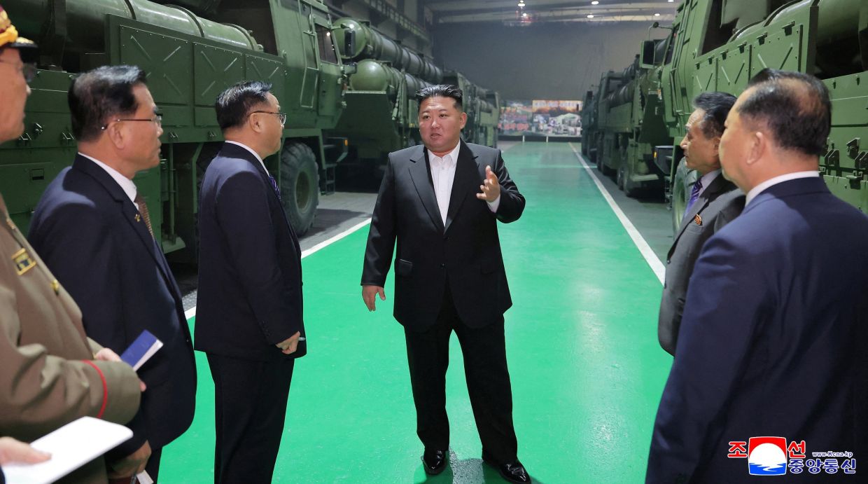 North Korea's Kim touts new rocket launchers that could target South
