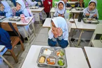 Indonesia's free meal scheme to reach 80 million recipients by April, behind target