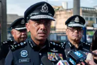 Cops nab nine over armed brawl in PD