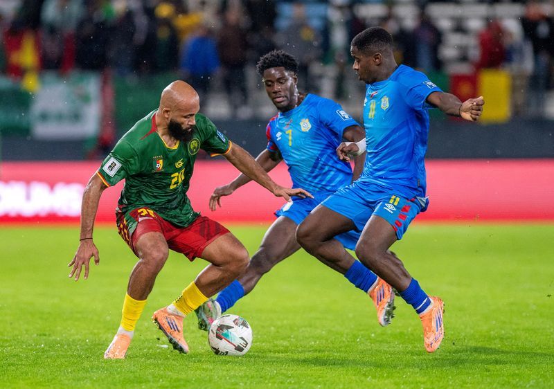 Soccer-Cameroon's Mbeumo feeling pressure to succeed, coach Pagou says