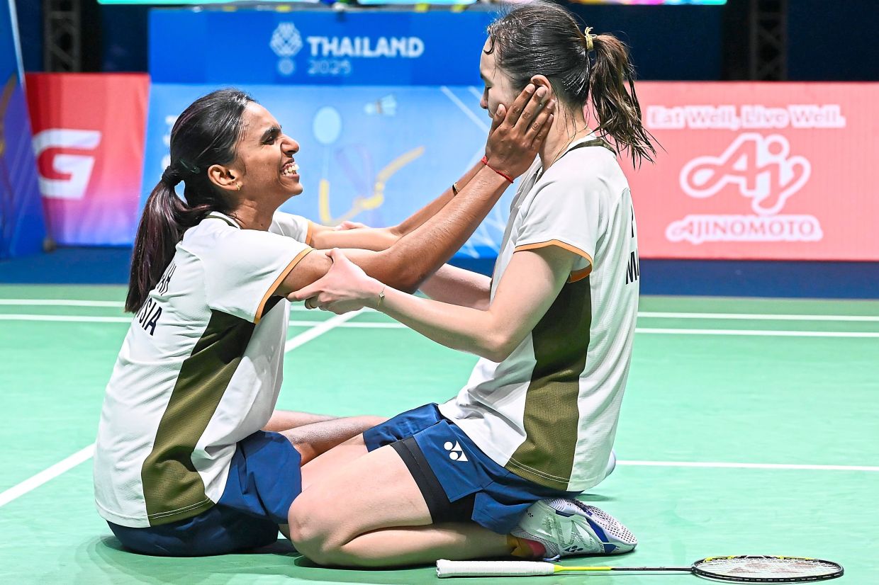 M. THINAAH and PEARLY TAN