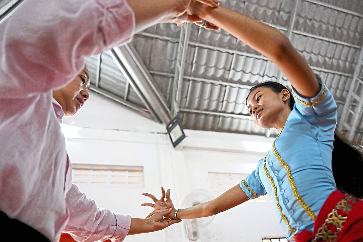 Khmer classical dance, performed to traditional music, is renowned for its graceful hand gestures. Photo: AFP