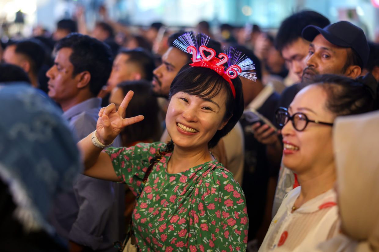 Revellers thronging Bukit Bintang for thethe Visit Malaysia 2026 countdown festival is being held. - Photo: Bernama