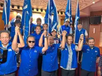 Rival candidates bury the hatchet for Barisan victory