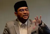 Mujahid settles defamation suit against PAS out of court