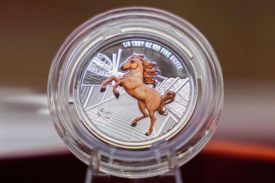 A close-up of the Singapore Year of the Horse 1/4 troy oz 999 fine silver colour coin. - Photo: ST