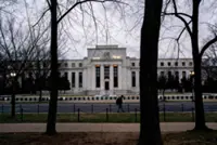 Most Fed officials expect more rate cuts