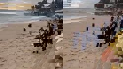 Woman drowns off Sydney beach on New Year's morning, man missing