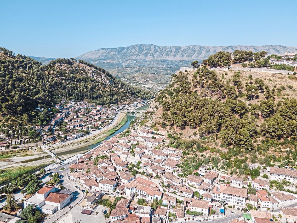 The red-tiled roofs of the houses in Berat, a Unesco World Heritage Site, line the banks of the Osum River.