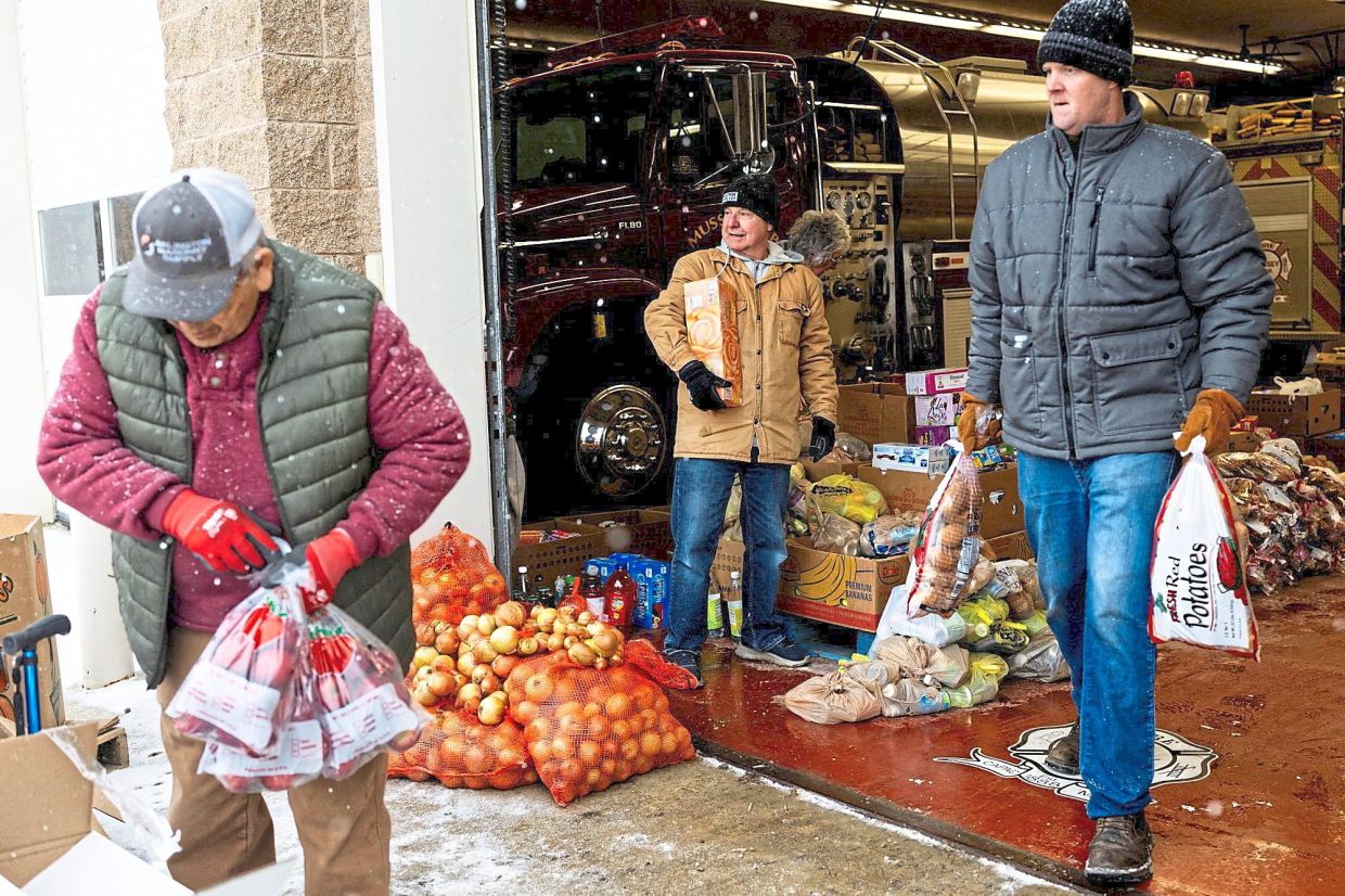 Line for groceries, line for hope