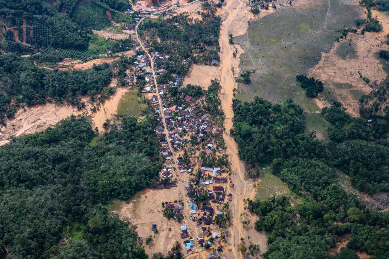 An aerial view shows the damage after floods and landslides in Central Tapanuli, North Sumatra, on December 21, 2025. --Photo by AHMAD RIDWAN NASUTION / AFP