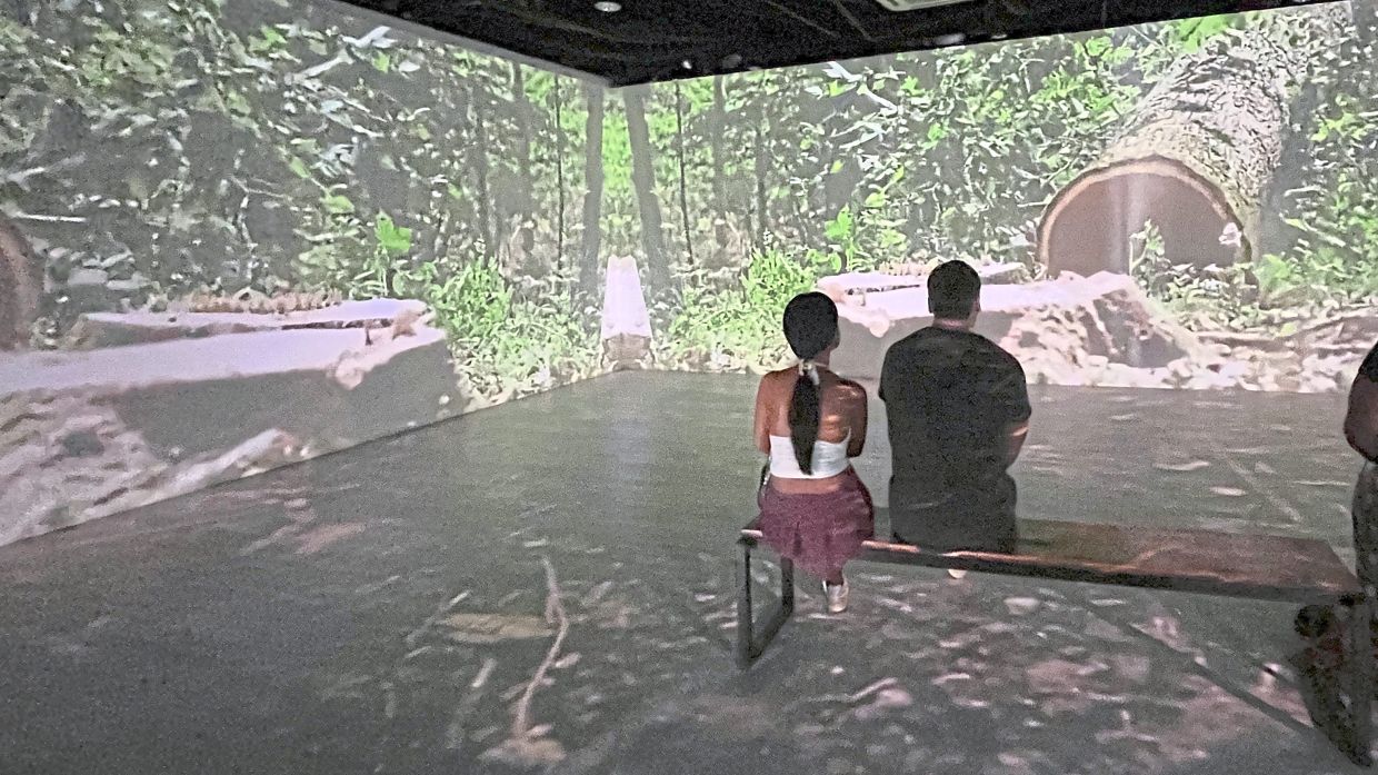 Visitors view an immersive film showcase at Galeri Filamen in Muzium Telekom in KL. Photo: The Star/M. Irsyad 