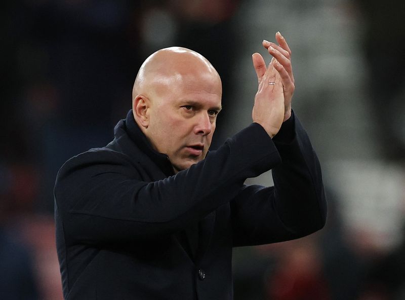 Soccer-Slot calls for 'magic' as Liverpool seek to bridge gap to title contenders