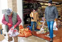 Line for groceries, line for hope