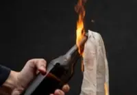 Molotov cocktail, dead chickens sent to Indonesian government critics, rights groups say