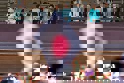 Japan's emperor and his family greet New Year well-wishers