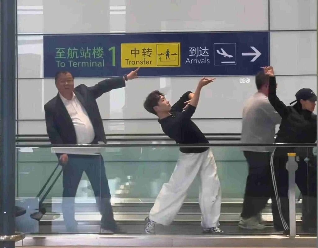 Video of Chinese uncle joining dancers on walkway with funny pose gains 10 million views