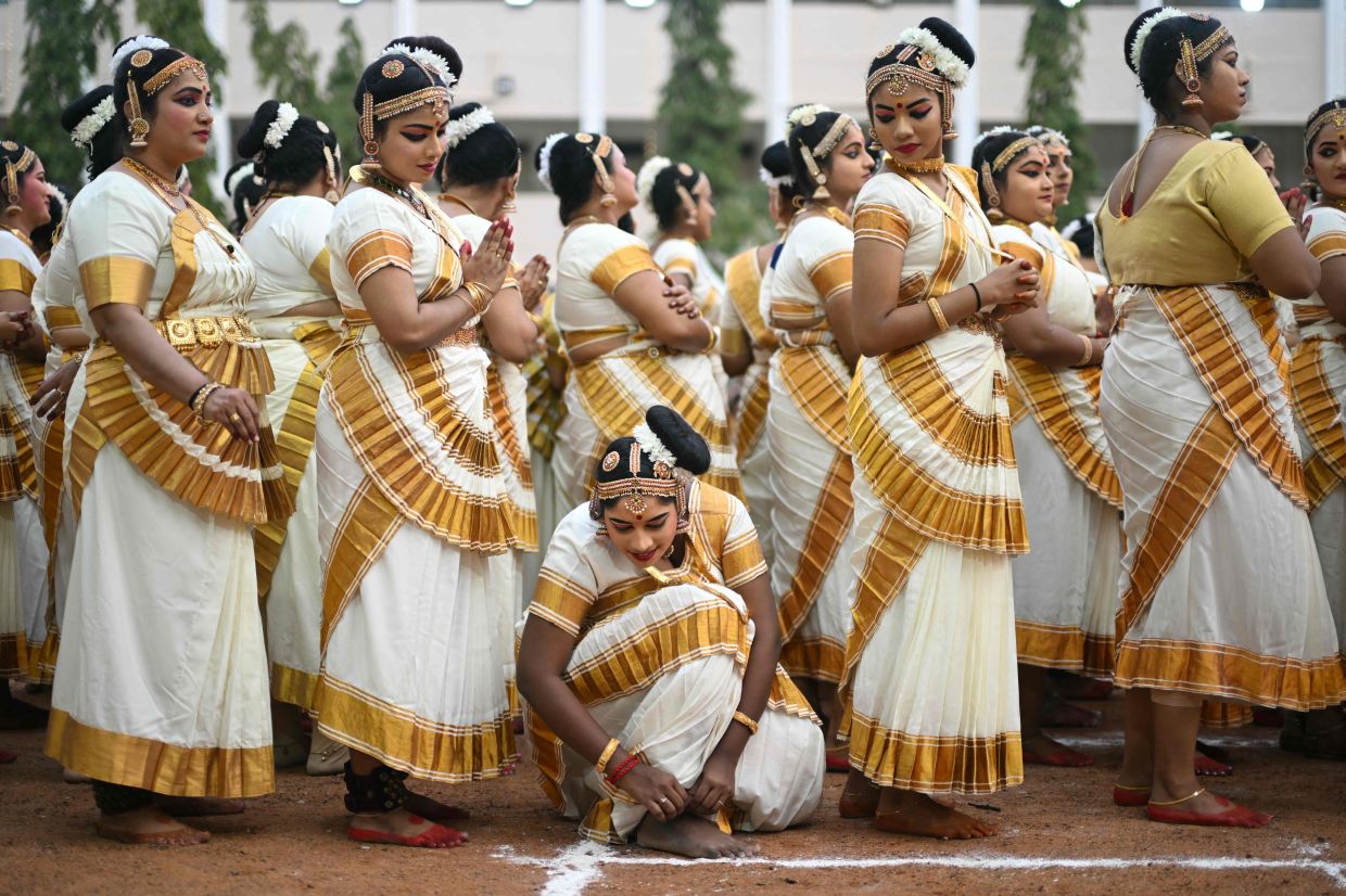 TOPSHOT - Indian artists wait to perform Mohiniyattam, an indigenous classical dance form of Kerala, during a cultural event in Chennai. -- Photo by R.Satish BABU / AFP