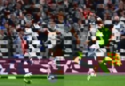 Soccer-Palace sign winger Johnson from Spurs in club-record deal