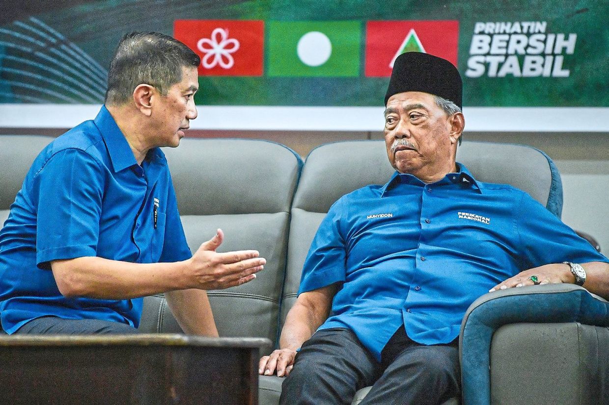 National figure: Muhyiddin (right), here seen with Azmin, has been Perikatan’s glue – acceptable to Malay conservatives yet not threatening to fence-sitters uneasy with PAS’ ideological edge. — Bernama