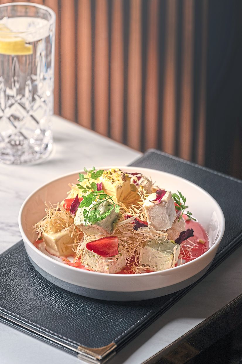 Pistachio, mango and coconut kulfi take centre stage in this decadent Indian ice-cream dessert.